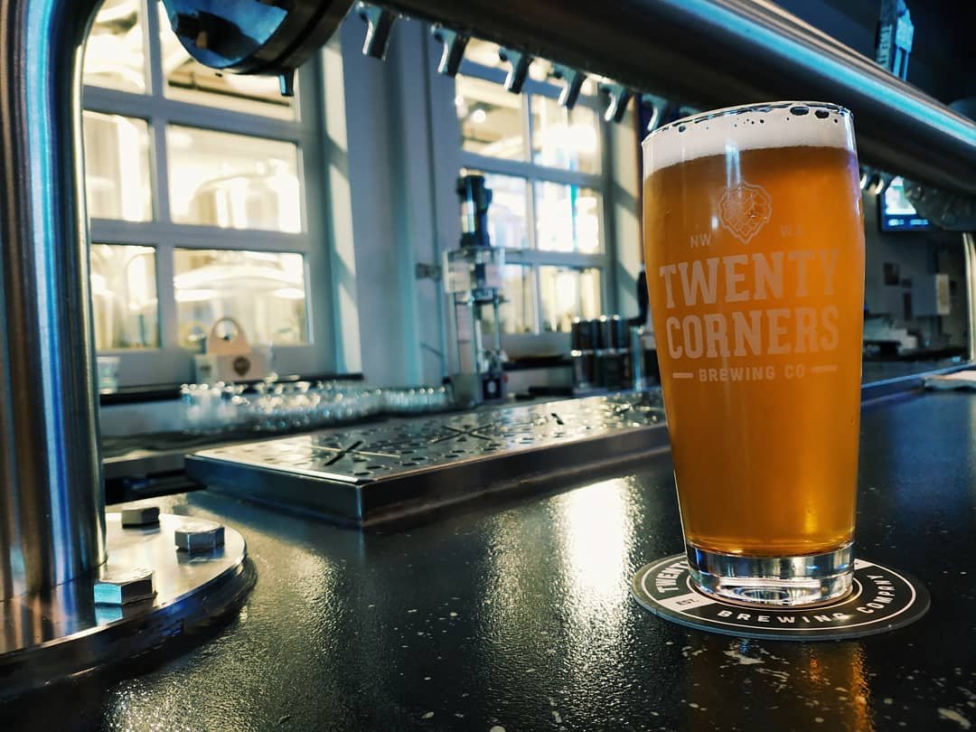 Freshly poured beer on the bar at 20 Corners Brewing near Bothell, Washington.
