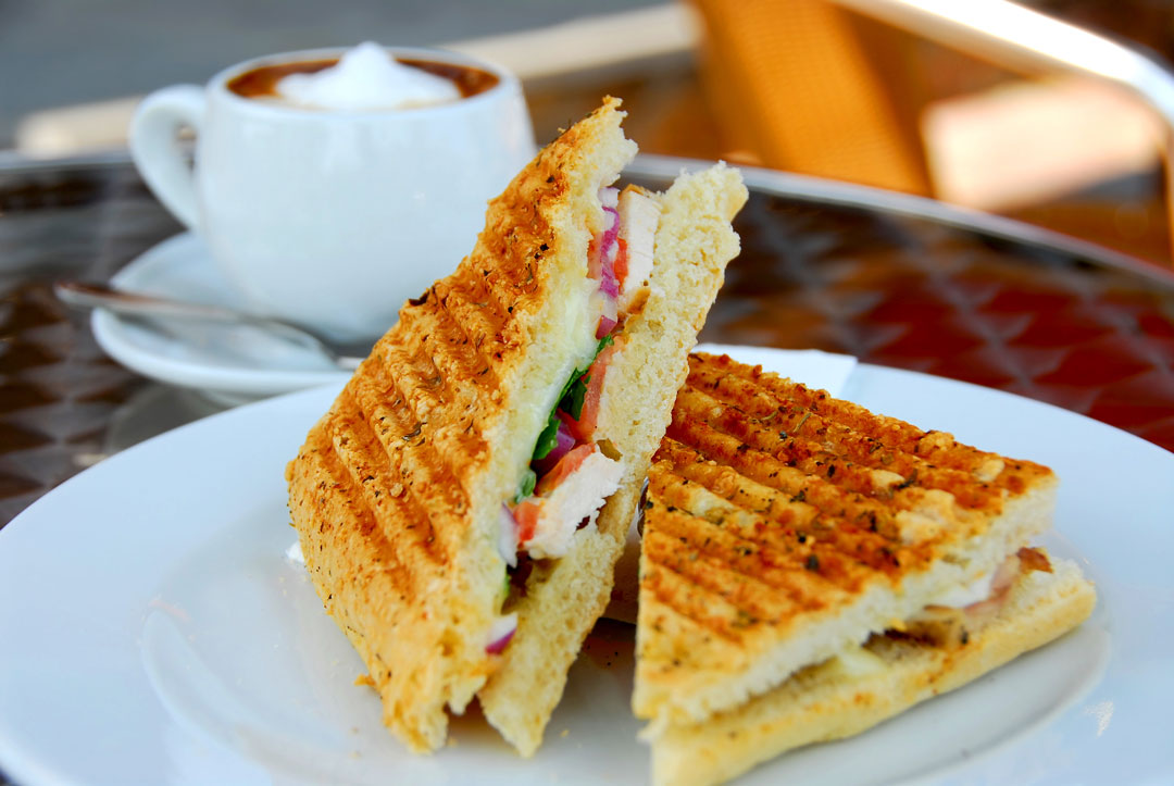 Panini sandwich and cup of coffee from Gretchen's Place in Bothell, Washington.