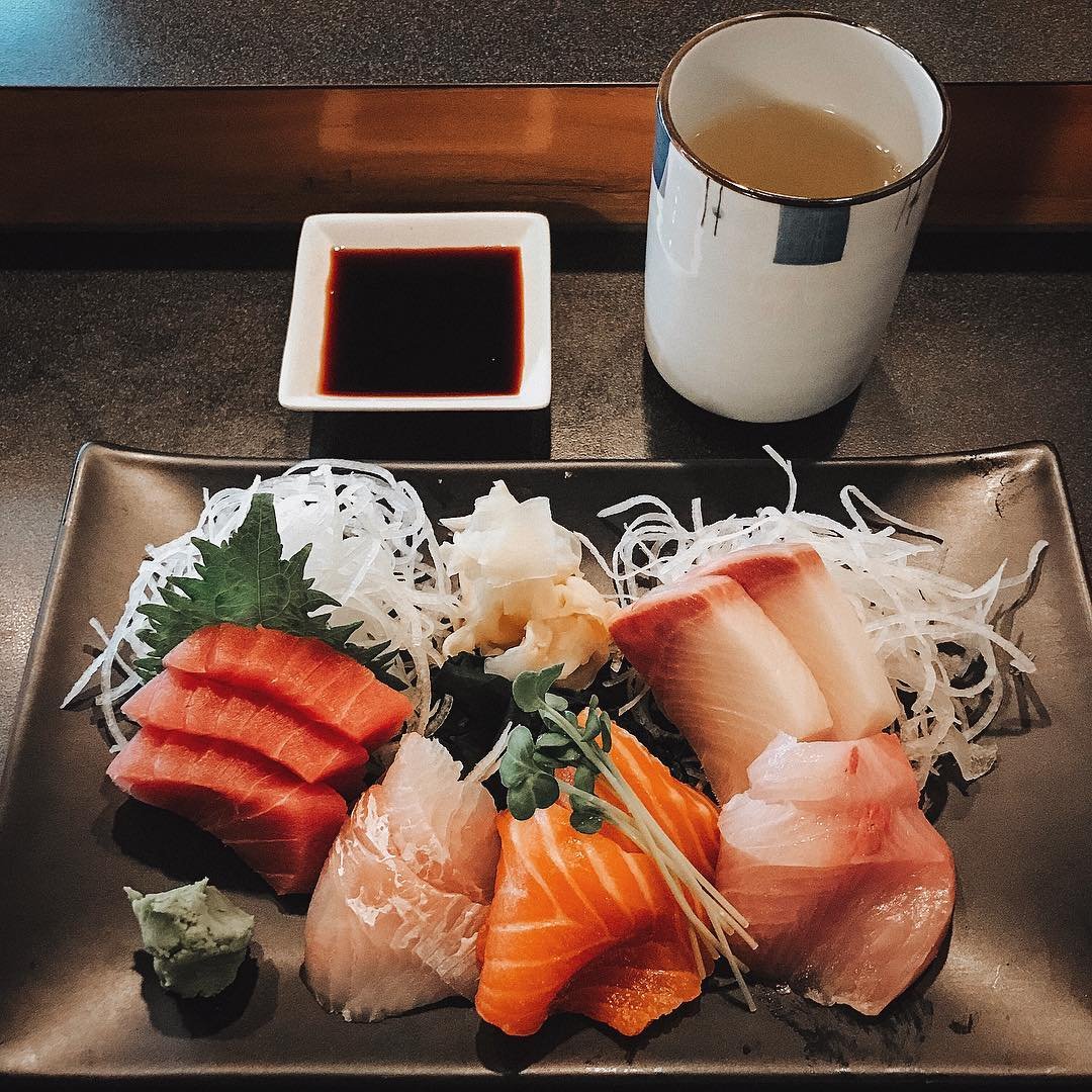 Plate of sushi, dish of soy sauce, and a cup of tea from Hana Sushi in Bothell.