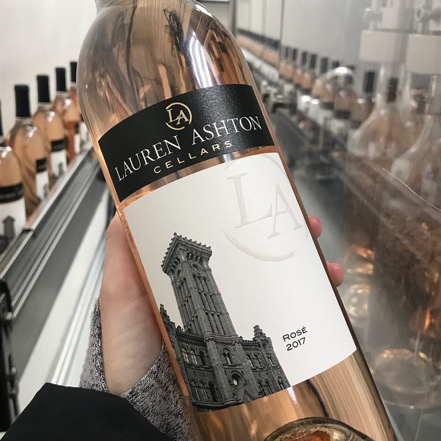 Person holding a bottle of rosé wine from Lauren Ashton Cellars near Bothell, WA.