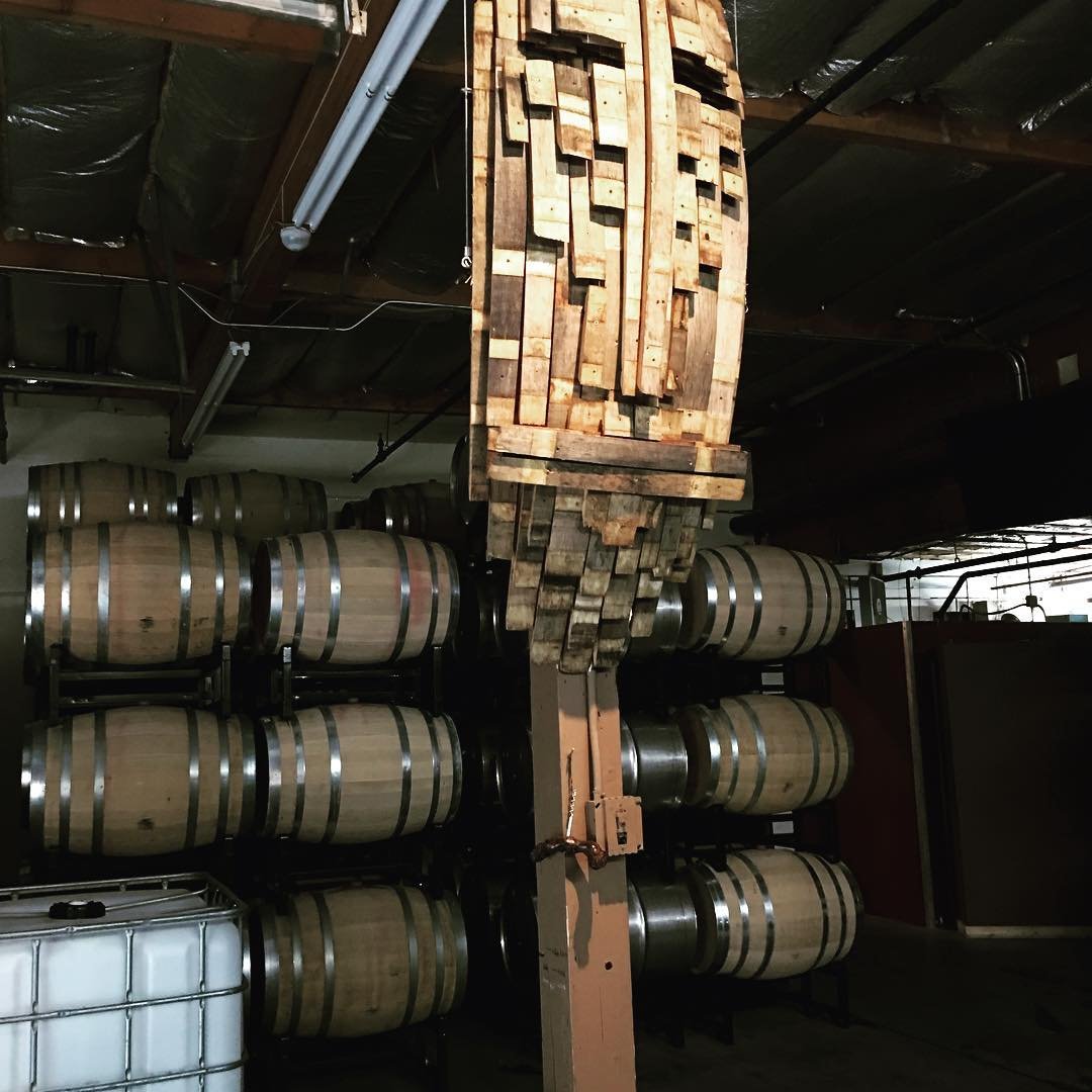 Large barrels of wine inside of Stevens Winery near Bothell, Washington.