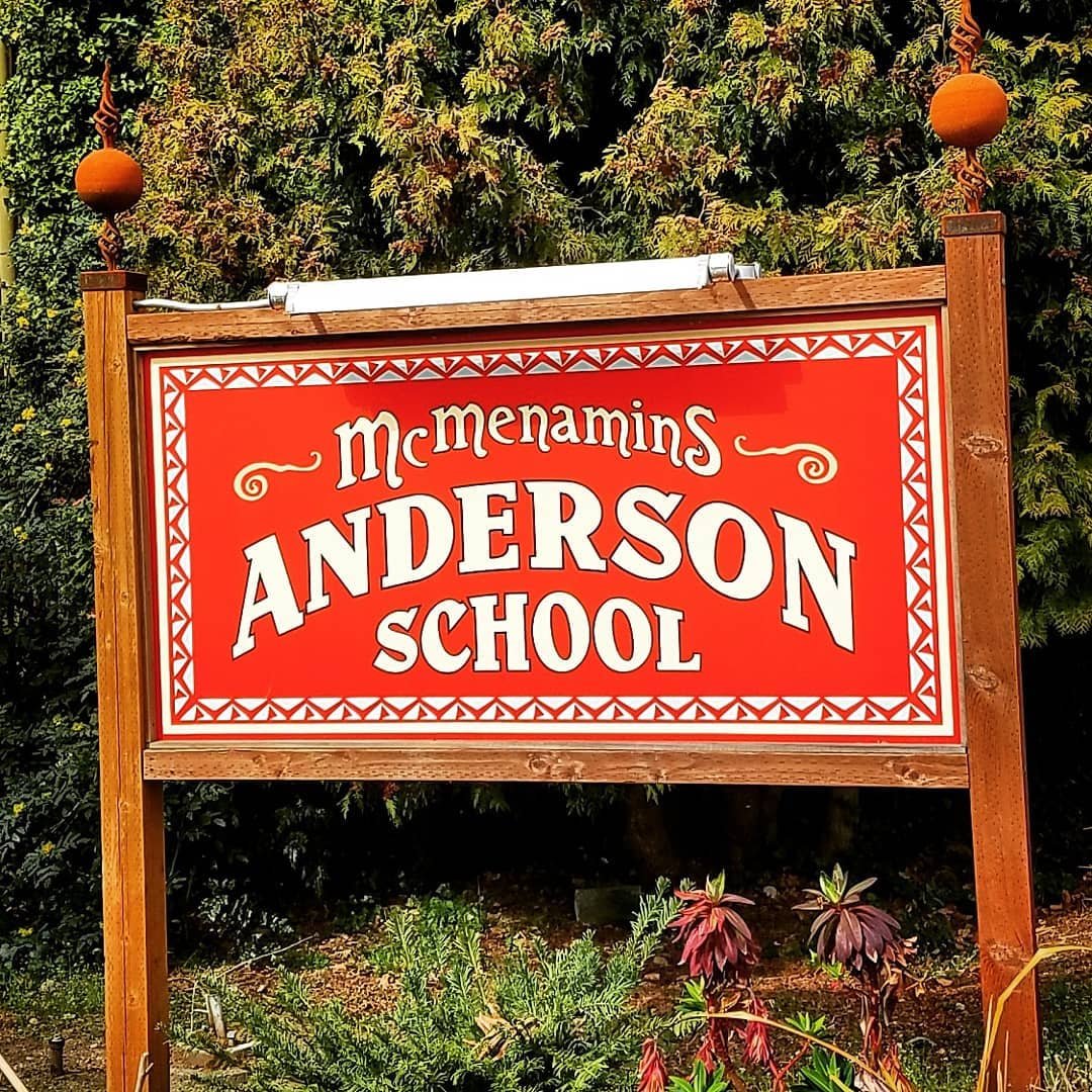 Sign outside the Market at McMenamins Anderson School in Bothell, Washington.