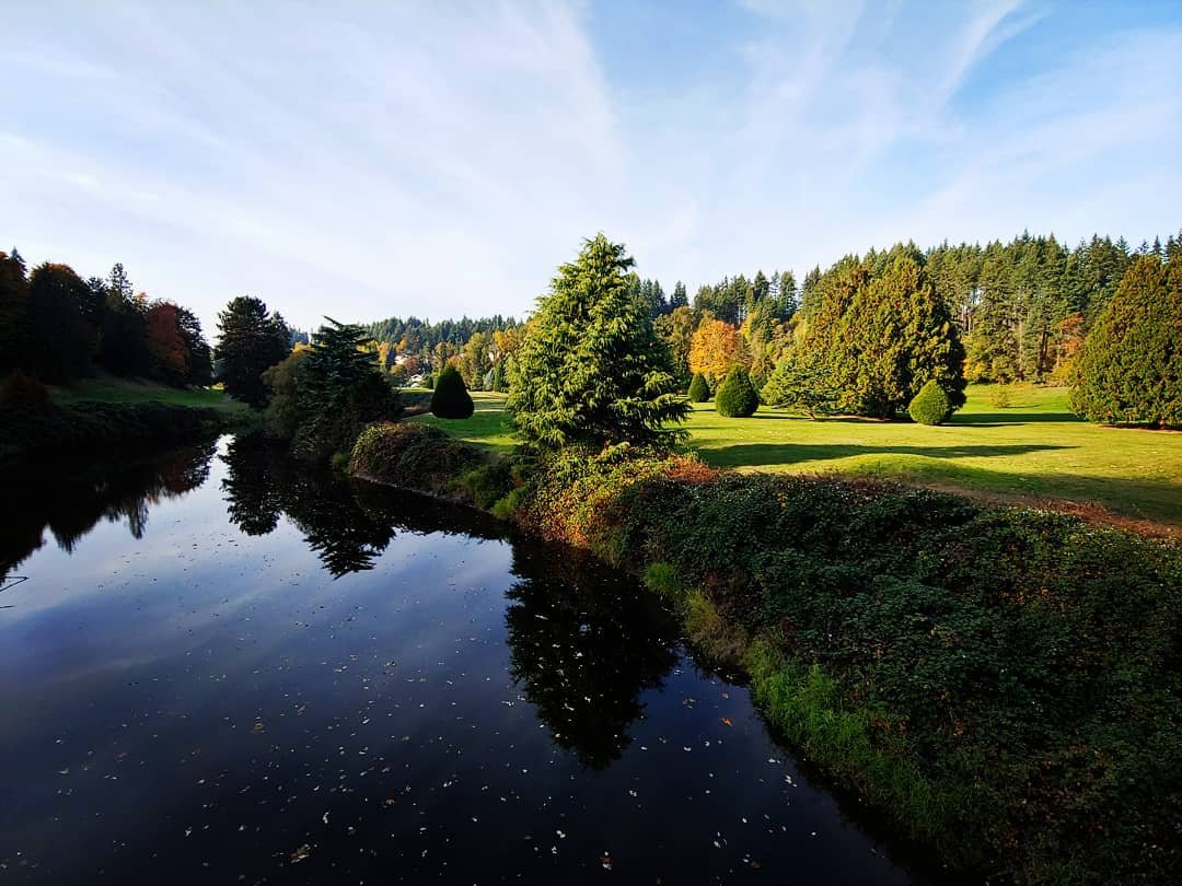 View of the golf greens and river at Wayne Golf Course in Bothell, Washington.