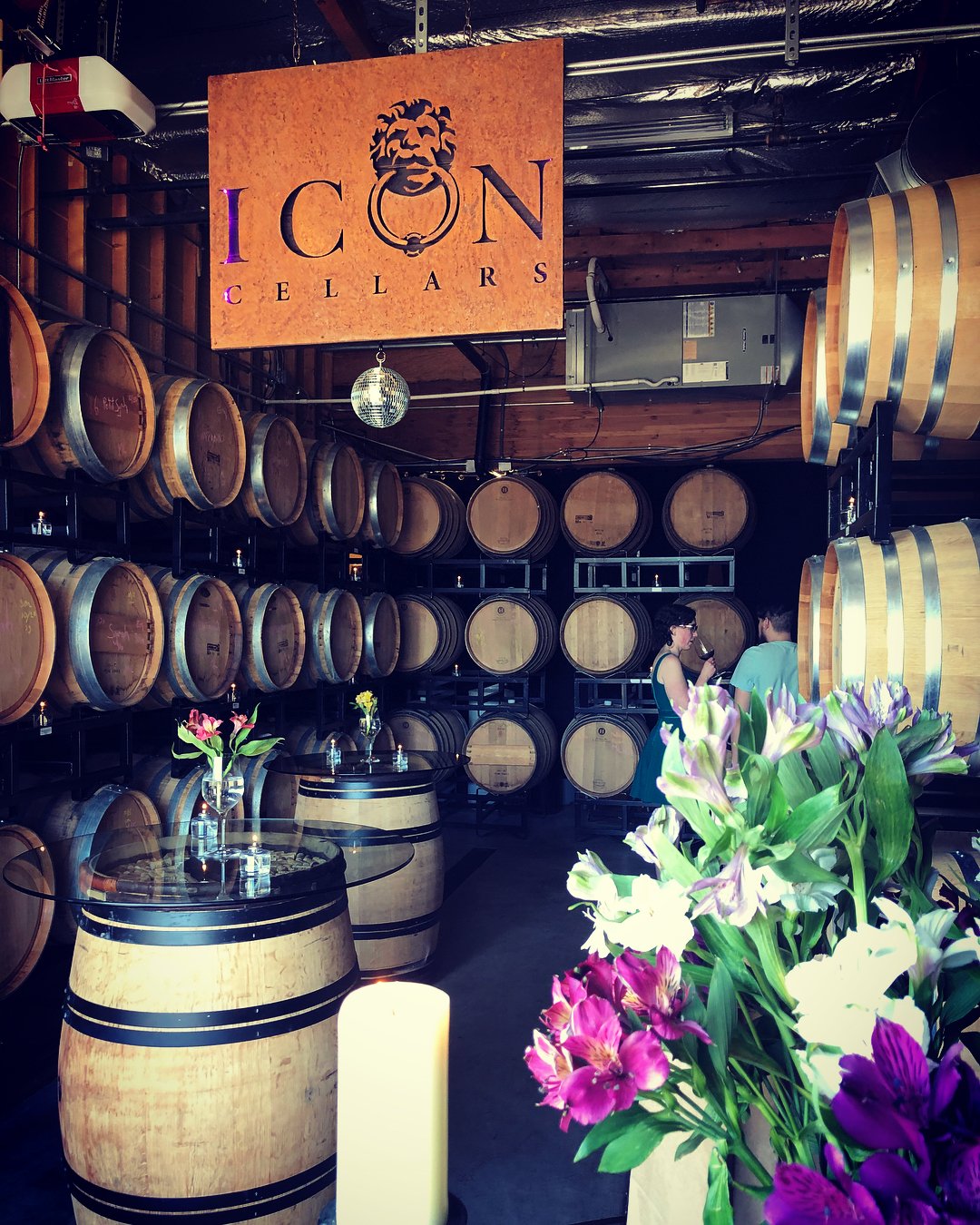 Tasting room filled with barrels of wine at Icon Cellars near Bothell, Washington.